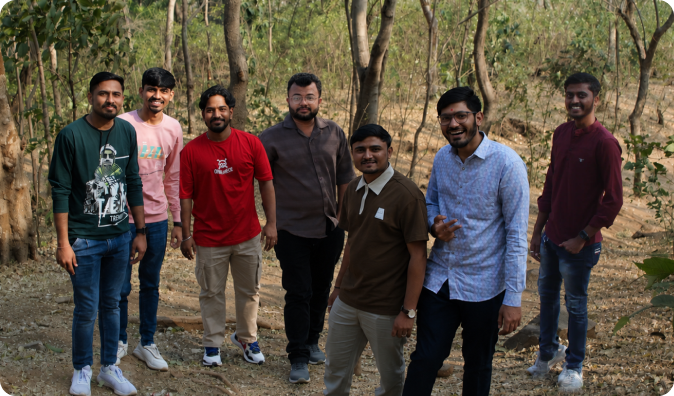 Team trekking in forest